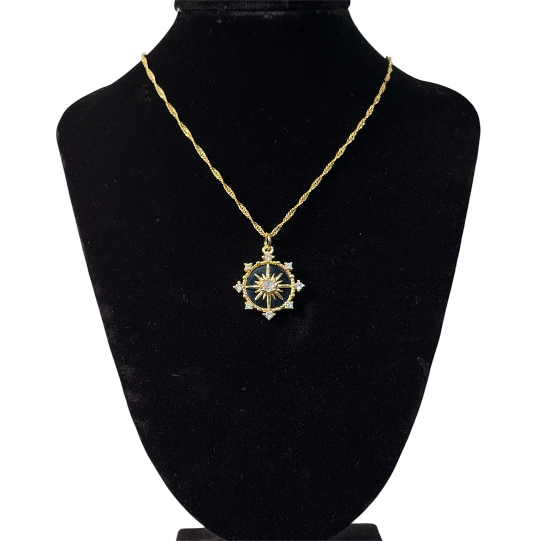 Black Celestial Compass Starburst Pendant on Gold Chain