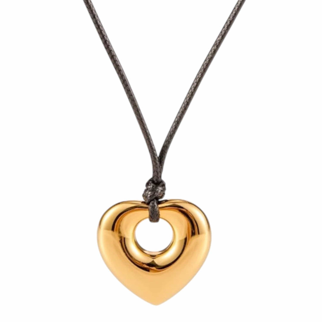 Gold Heart Shaped Pendant on Leather Cord