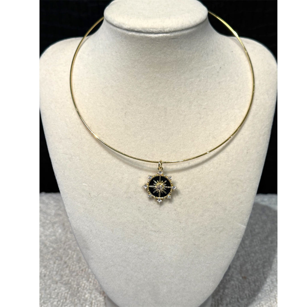Black Celestial Compass Starburst Charm Pendant on Gold Wire Choker